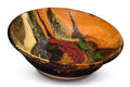 Handmade pottery bowl.  12 inch diamenter.  Earth tone and red colors accented with a ribbon of blue.  Handmade by Prairie Fire Pottery.  3/4 view of the bowl.