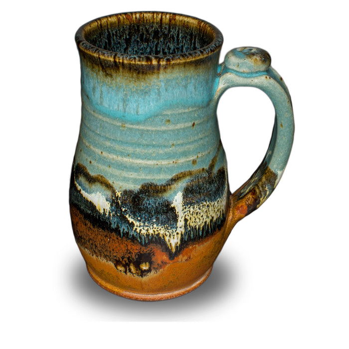 Handmde 20 ounce pottery mug.  Turquoise and brown colors.  Hand made by Prairie Fire Pottery.  Right side view.