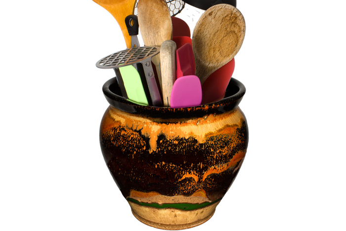 Spoon view of a beautiful toasted orange over red on a handmade pottery spoon crock.  Hand made by Prairie Fire Pottery.