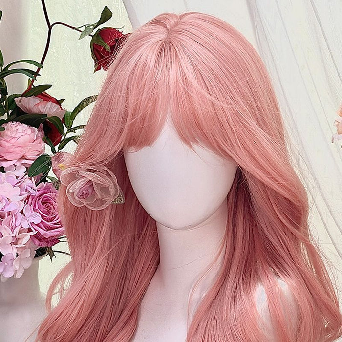 A full grapefruit pink wig for women with long curly hair