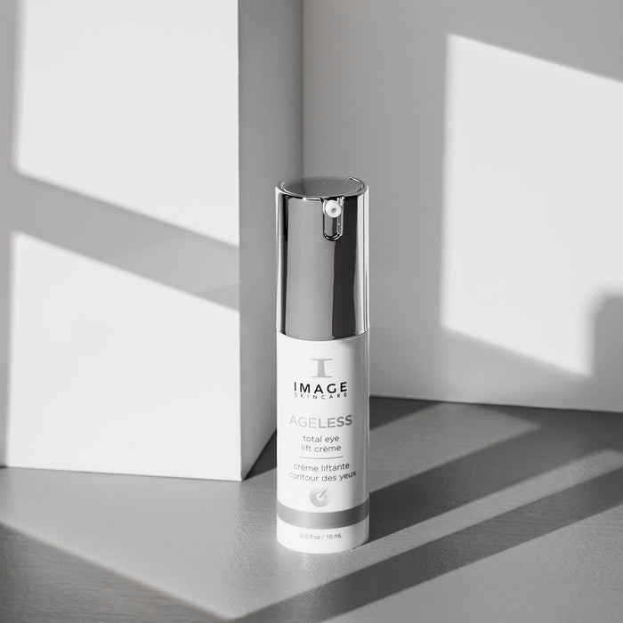 Ageless eye lift creme bottle on gray background