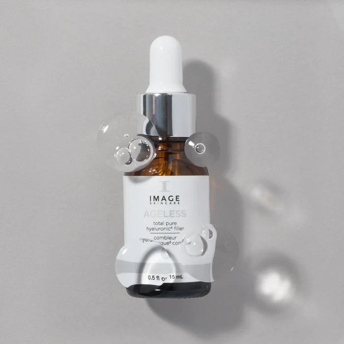 Ageless pure hyaluronic filler bottle on gray background with bubbles