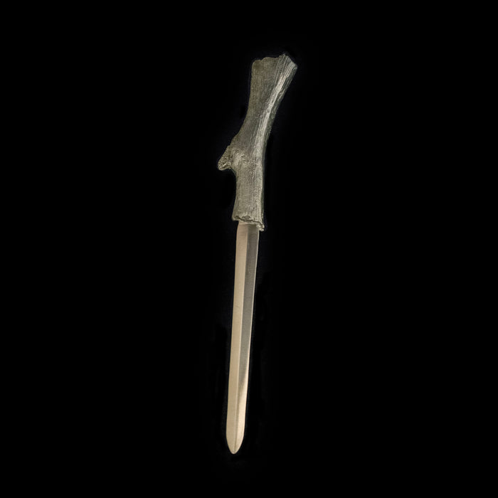 Image of the Michael Michaud Bark Letter Opener on a black background