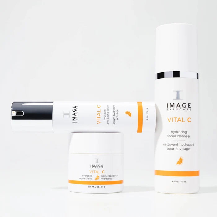 Image Skincare products including a cleanser, moisturizer, and serum on a white background