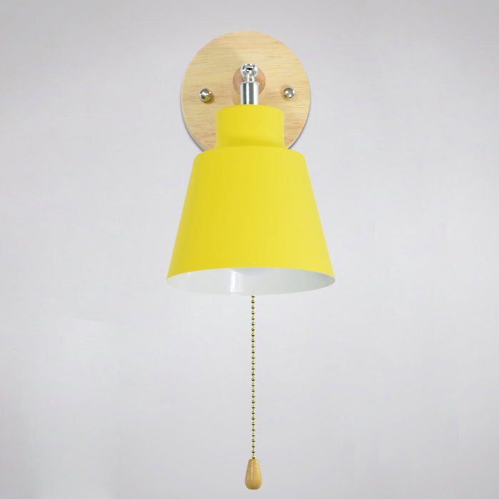 Claudia rotating wall sconce painted metal shade with wood backplate and gold tone pull chain 180° rotation