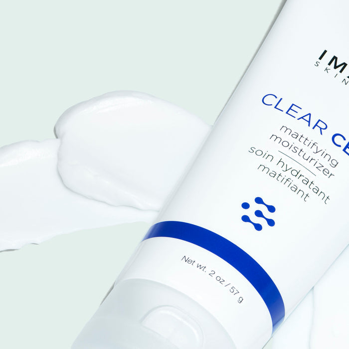 clear cell mattifying moisturizer bottle close up on product swatch