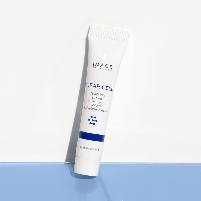 clear cell restoring serum travel size on light background