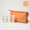 orange bag with 4 image skincare sample size products on gray background