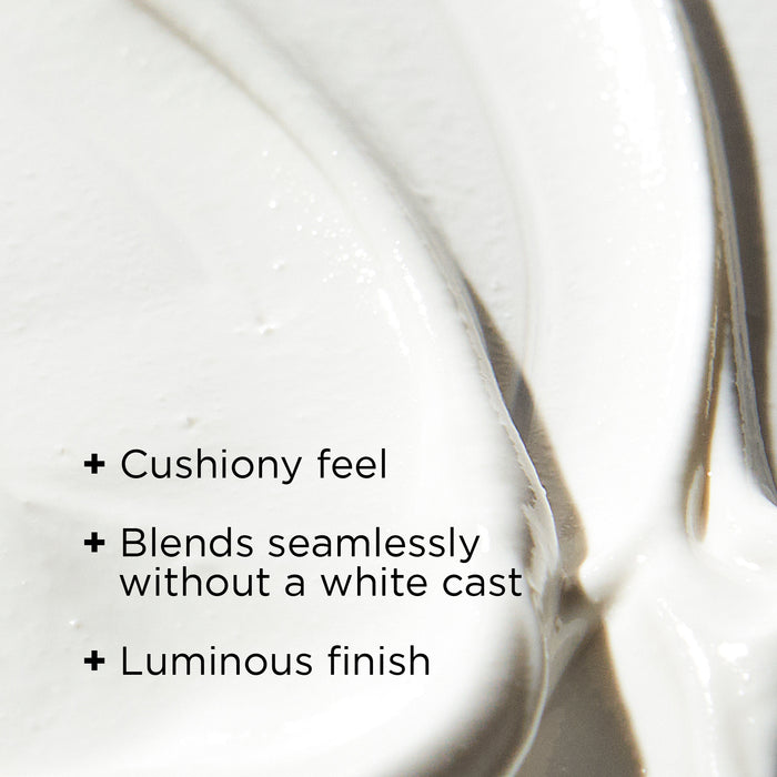 Close-up texture of Image Skincare's Daily Prevention Ultra Defense Moisturizer with SPF 50, showcasing its rich, creamy consistency against a clean white background.