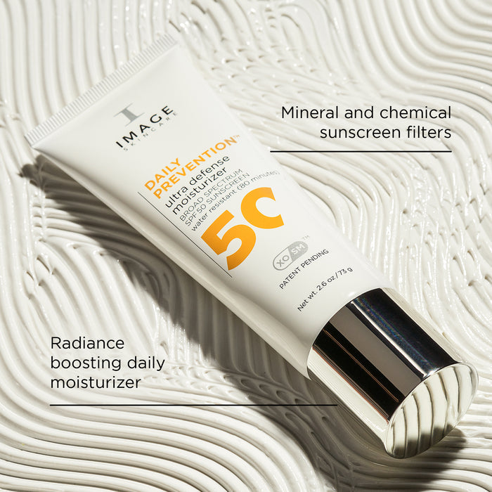 IMAGE Skincare Daily Prevention Ultra Defense Moisturizer with SPF 50 in a white tube with a silver cap.