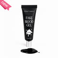 Sunset Makeup Fake Blood Gel in a black squeeze tube with a silver cap, shown with a pool of black gel on a white background and a pink 'new' ribbon in the top-left corner.