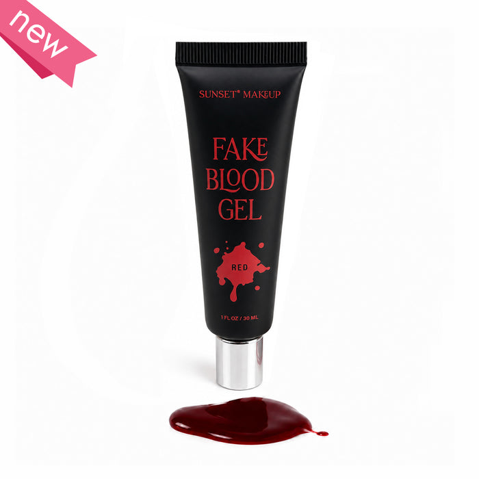 A squeeze tube of Sunset Makeup Fake Blood Gel with a silver cap, shown on a white background with a pool of dark red gel below and a pink 'new' banner in the top left corner.