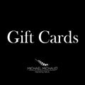 Image of the Michael Michaud Gift Cards on a black background