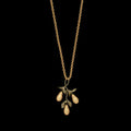 Image of the Michael Michaud Golden Pear Pendant - Long on a black background