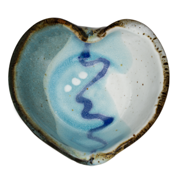 Turquoise and white Heart Bowl.  Handmade pottery.  Hand made by Prairie Fire Pottery in high-fired stoneware clay.  Overhead view.