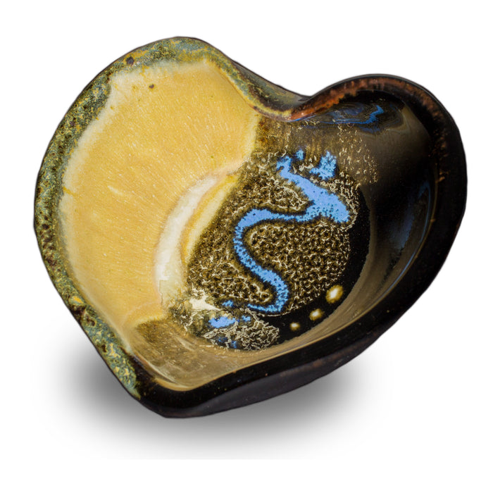 Stoneware heart bowl in yellow and black colors.  Handmade pottery by Prairie Fire Pottery.  Hand made in the U.S.A.  3/4 view.