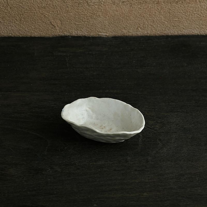 abstract round stone textured white ceramic bowl