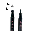 Two black Sunset Makeup moon stamp eyeliner applicators displayed on a white background with a black moon stamp impression.