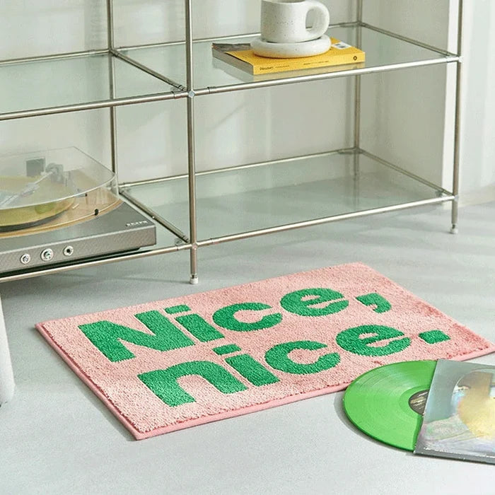 statement graphic tufted bath mat and runner rug in contrast colors