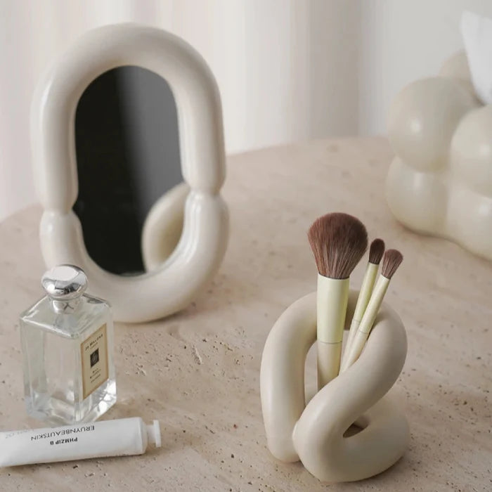 sculpted knot ceramic holder for vanity, bathroom and home decor