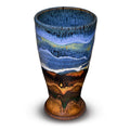 This is a beautiful 16 ounce tall cup in cobalt blue and toasted orange colors.  It is handmade pottery by Prairie Fire Pottery.  Hand made in stoneware clay and kiln-fired to 2400°.