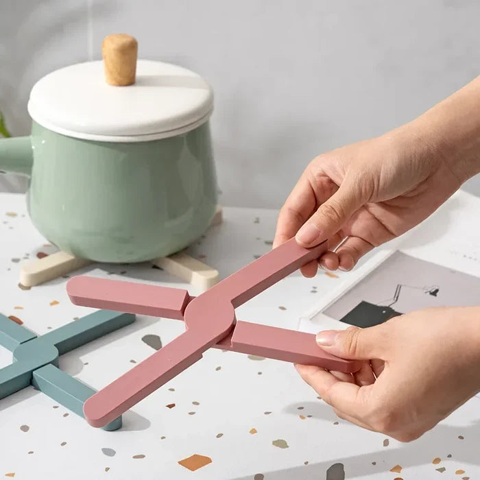Foldable silicone heat resistant Crossfold Coaster Trivet, non-slip pot pan mat and coaster set in modern multi-color shades for kitchen table protection