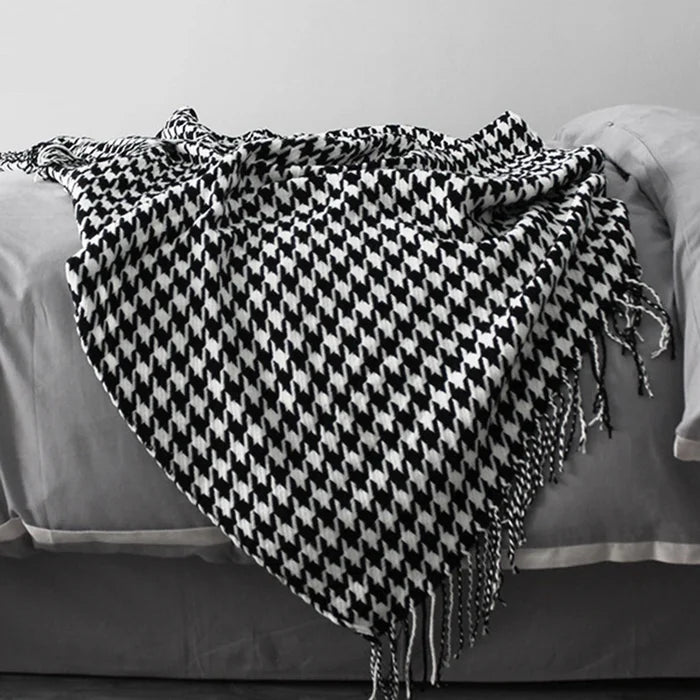 Vintage geometric knitted throw blanket with tassels in houndstooth and grid patterns